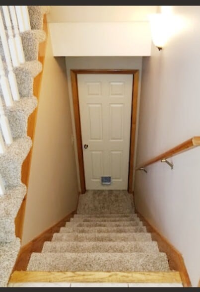 Stairway to den area - 21506 W 53rd Terrace