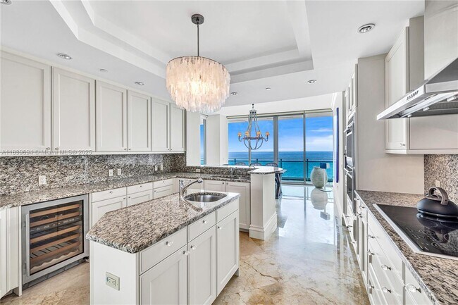 Building Photo - 10295 Collins Ave