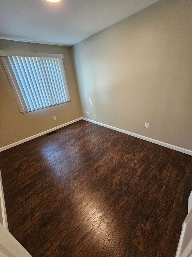 Building Photo - Clean 3-Bedroom Tri-Level, 1.5 Bath with Updated Kitchen, Great Room, Fireplace & Private Backyar...