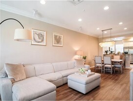 Open and well-lit floor plan with high ceilings - 5429 Strand