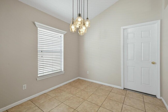 Building Photo - 1727 Canopy Oaks Dr