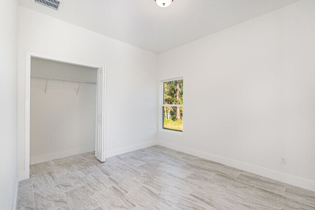 Building Photo - BRAND NEW! 4/2 PALM BAY!