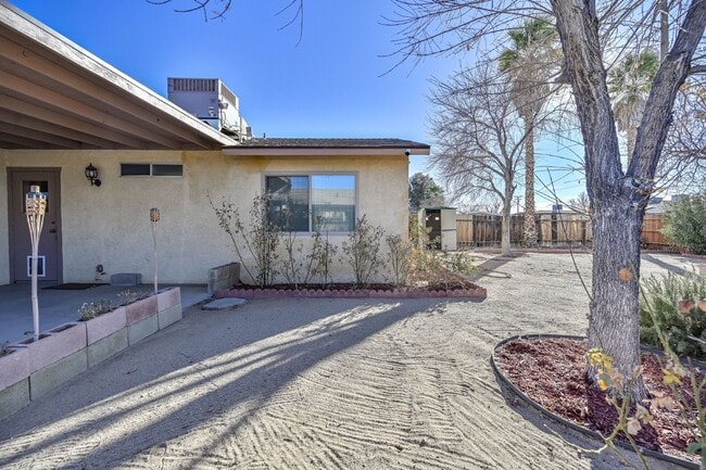 Building Photo - 3 bedroom, 2 bath with large living room and brick fireplace.  Good size kitchen with tons of cab...