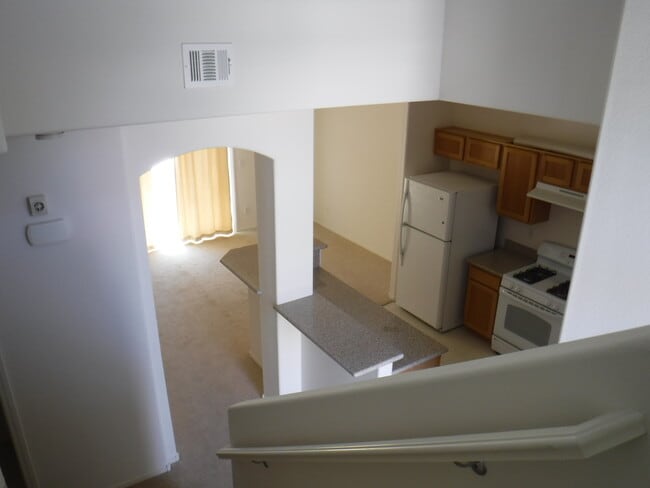 Building Photo - 3 BEDROOM HOME IN GATED COMMUNITY WITH COM...