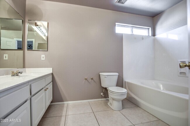 Building Photo - 6660 E Riverdale St