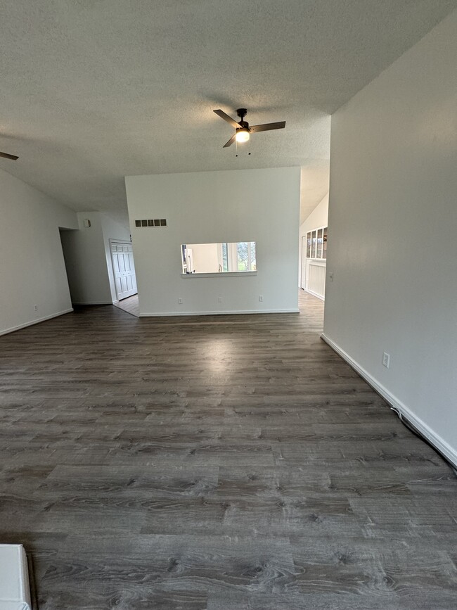 Open living room floor plan looking at kitchen - 465 N Burkhart Rd