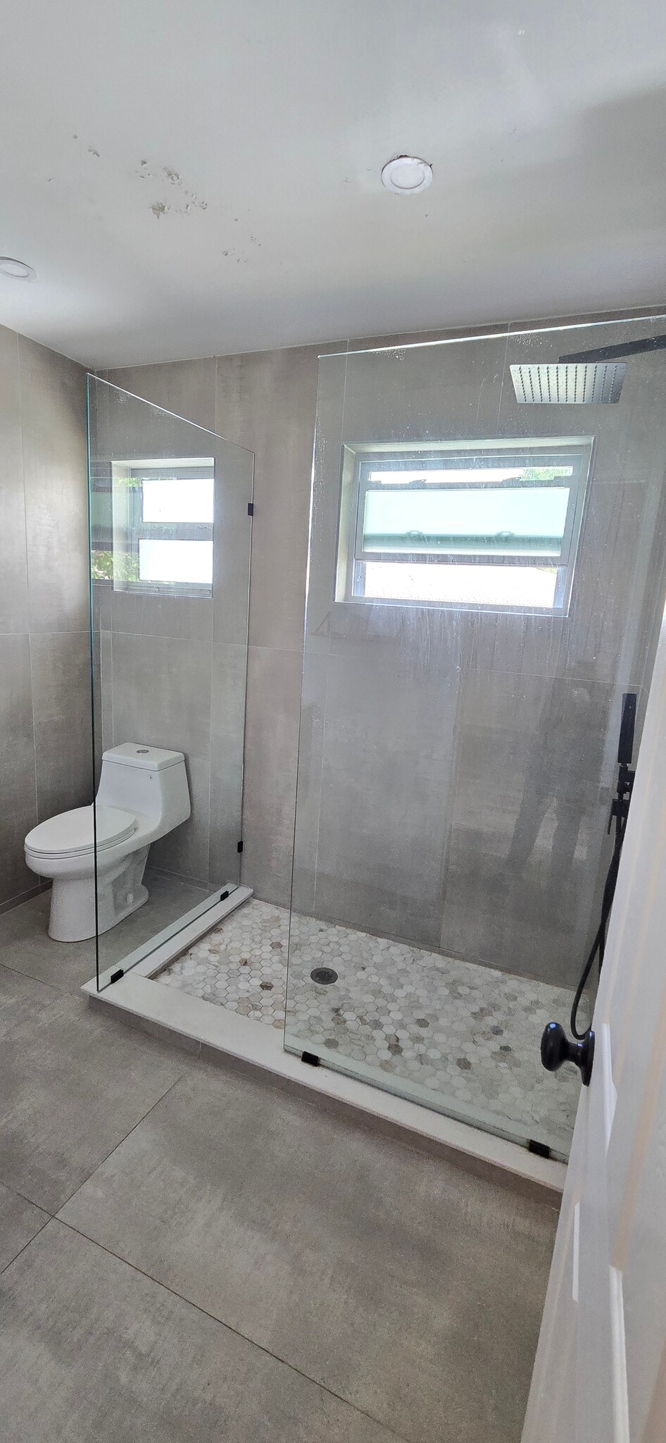 Glass shower - 201 NE 2nd Ave