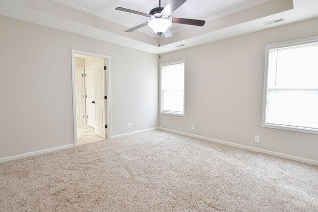 Building Photo - Pet Friendly Three Bedroom with Bonus!