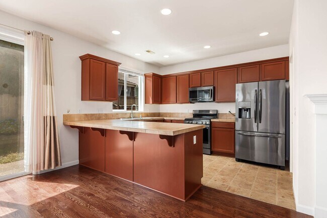 Building Photo - 3 Bedroom Home with Open Layout, Large Garage & Primary Suite