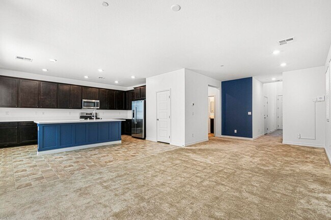 Building Photo - Modern 4-Bedroom Home in Gated Henderson Community | Built 2022