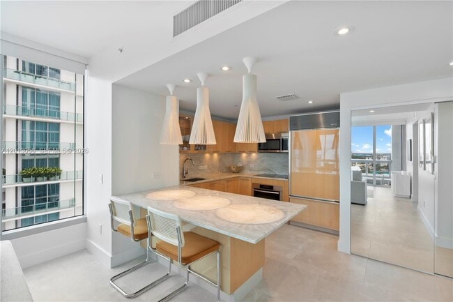 Building Photo - 6899 Collins Ave