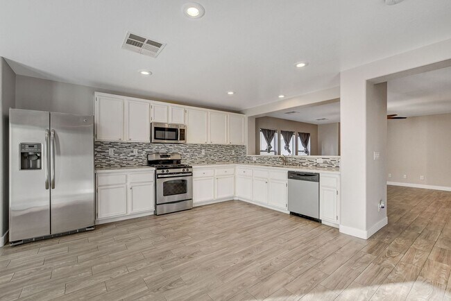 Building Photo - Totally Updated Solar Powered 4 Bedroom! Bedroom and Bath Downstairs!