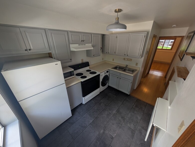 Kitchen with Washing Machine - 106 Spruce Ct