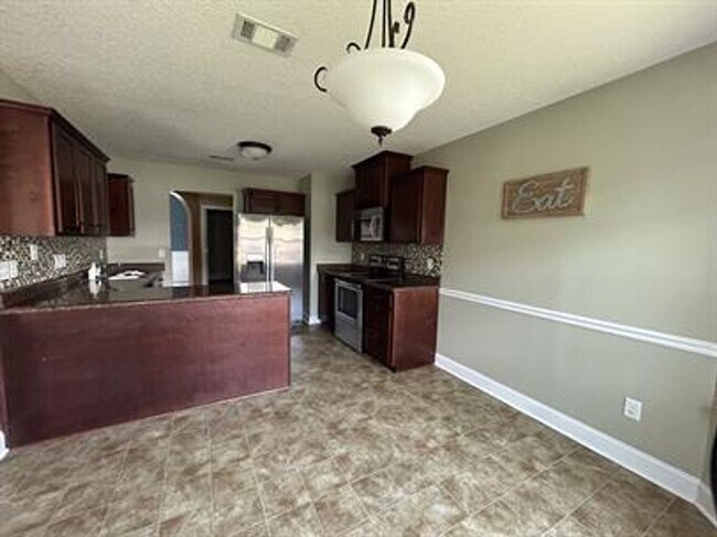 Building Photo - FALL MOVE-IN SPECIAL: $500 OFF 1st MONTH'S...
