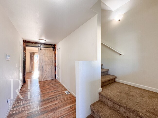 Building Photo - Spacious 3-Story Home with Flexible Living Space, Heat Pump & Private Deck Retreat
