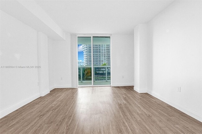 Building Photo - 10275 Collins Ave