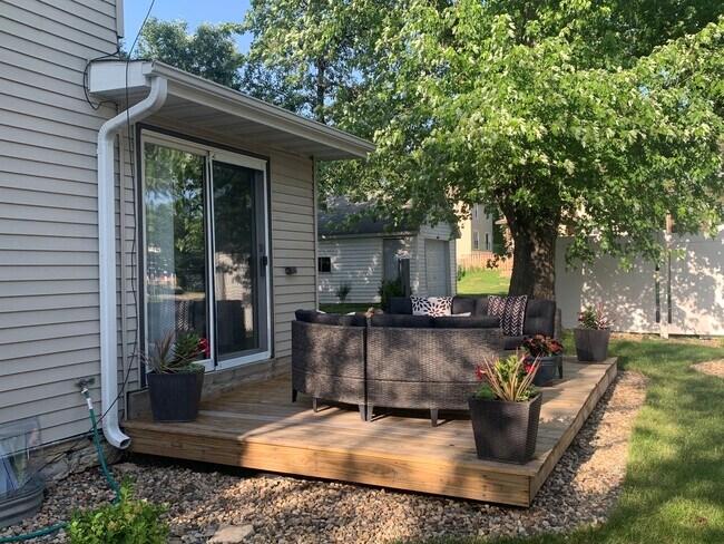 Deck area looking into shady backyard. - 222 6th Ave SE