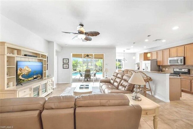 Building Photo - Elegant Furnished 3-Bedroom + Den Pool Home in VillageWalk of Bonita Springs – Available for Seas...