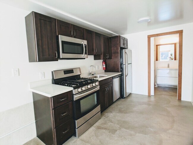 Building Photo - Charming remodeled lower unit with amazing yard and laundry