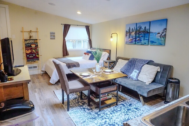 Coffee table turns into a dining table - 842 Tahoe Keys Blvd