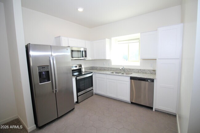 Building Photo - 2215 W Harmont Dr