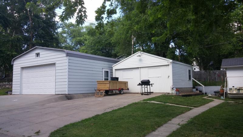 Small garage included with rental property. Larger garage is not. - 2024 Central Ave
