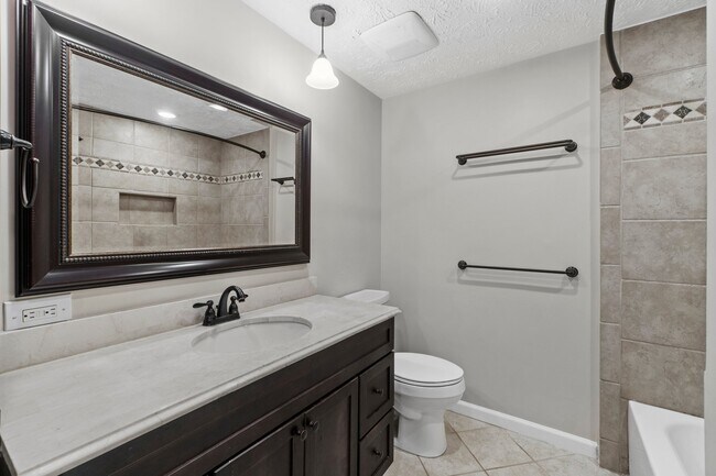 Building Photo - 7935 Tyson Oaks Cir