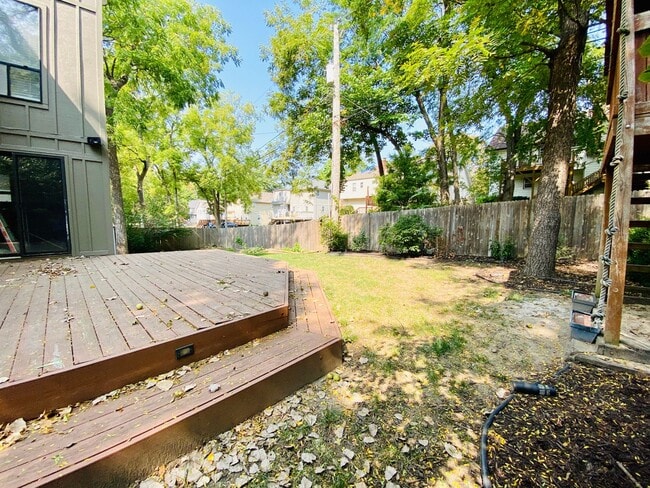Building Photo - {13042} Contemporary in Lenexa + Fenced Ya...