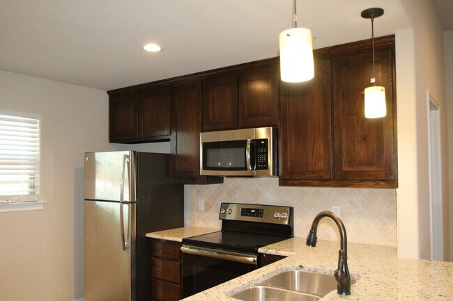 Building Photo - 1309-1313 White Sand Dr.