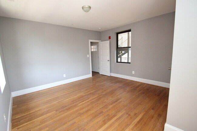 Building Photo - 211 W Lanvale St