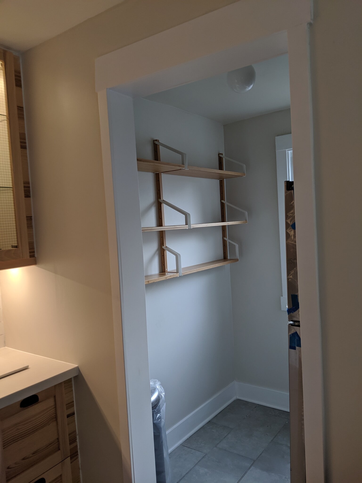 included wall shelving in the walk-in pantry (where fridge, washer/dryer also located) - 1448 Lincoln Ave