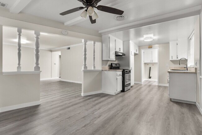 Building Photo - Charming Updated Home With Drive-Through Garage Access