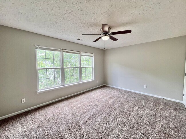 Building Photo - Charming 4BD, 2.5BA Durham Home with a Bonus Sun-Room & Fenced In Yard Only 10 Minutes Away from ...