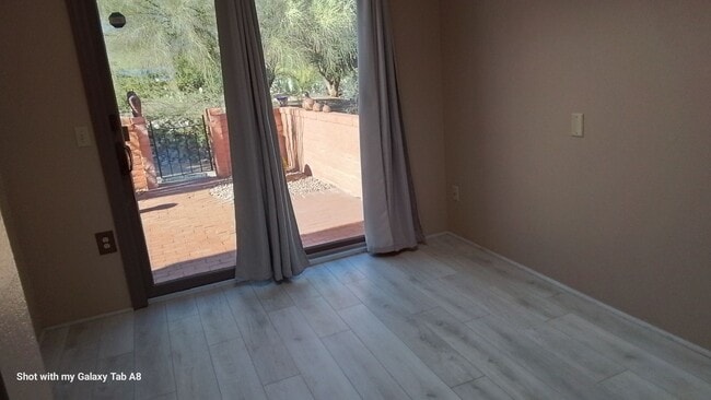 Building Photo - Unfurnished end unit townhome  55 and older community