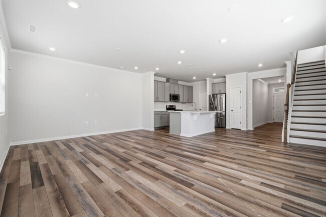 Building Photo - Upgraded 3BR Townhome in Wake Forest | Open Layout, Garage & Resort-Style Amenities