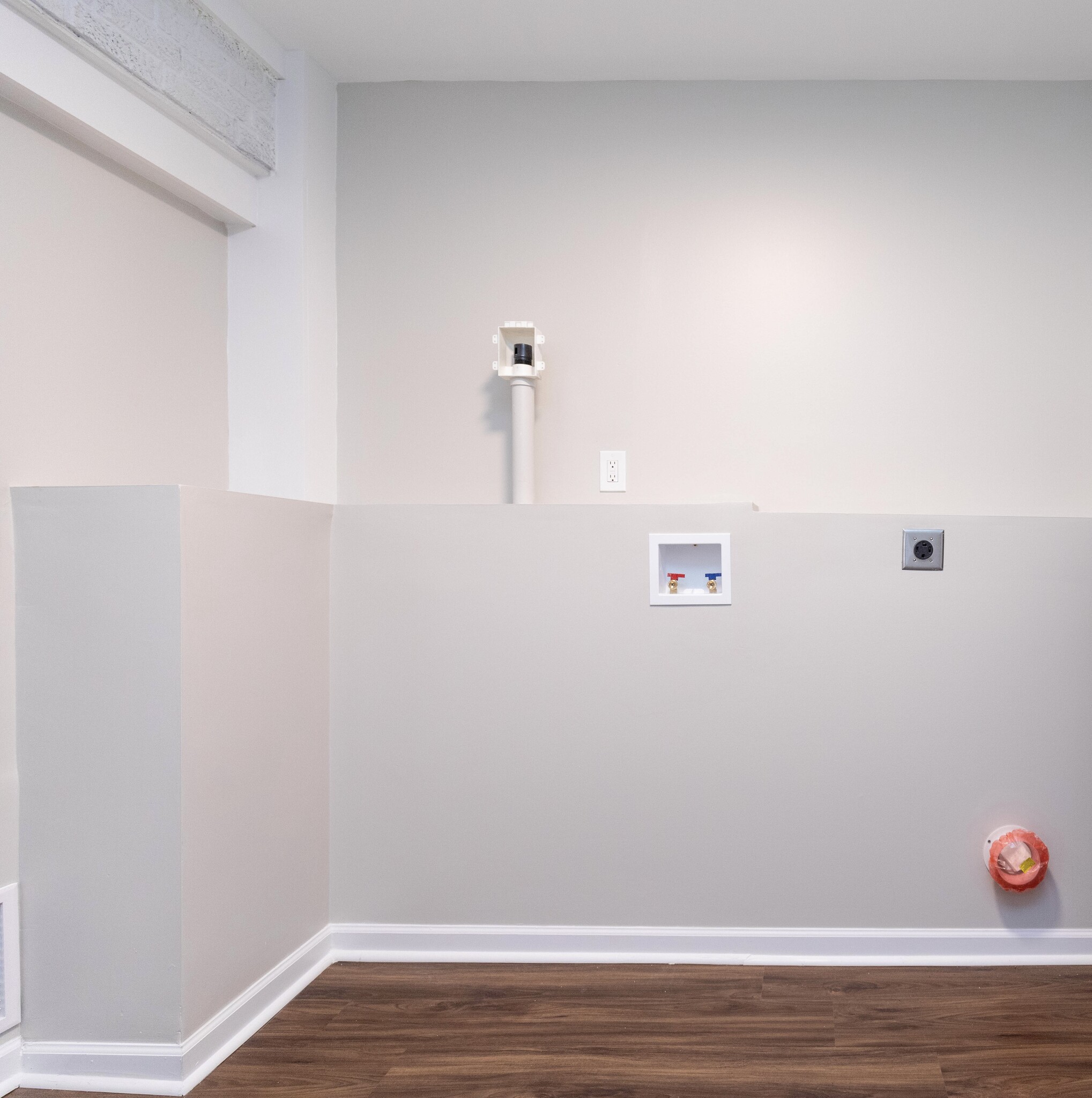 Separate laundry room with w/d hookup and area for storage. - 848 Argle Ave