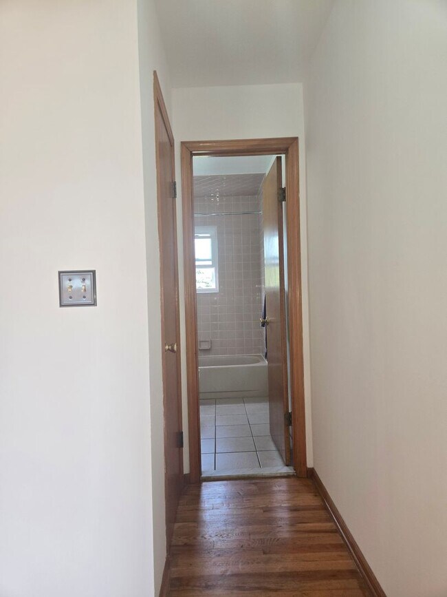 Building Photo - Updates abound at this SPACIOUS, half duplex with 3+ off-street parking spots, 3-bedrooms and 2 f...