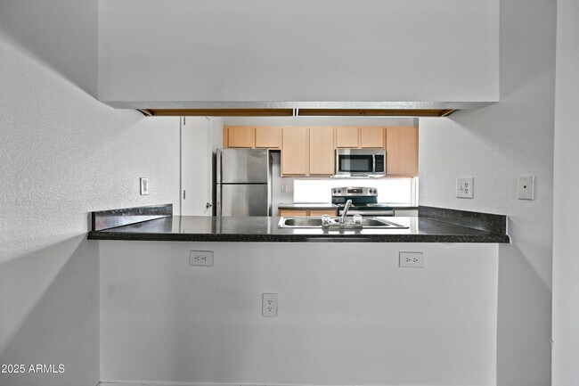 Building Photo - 3065 N 67th Ave