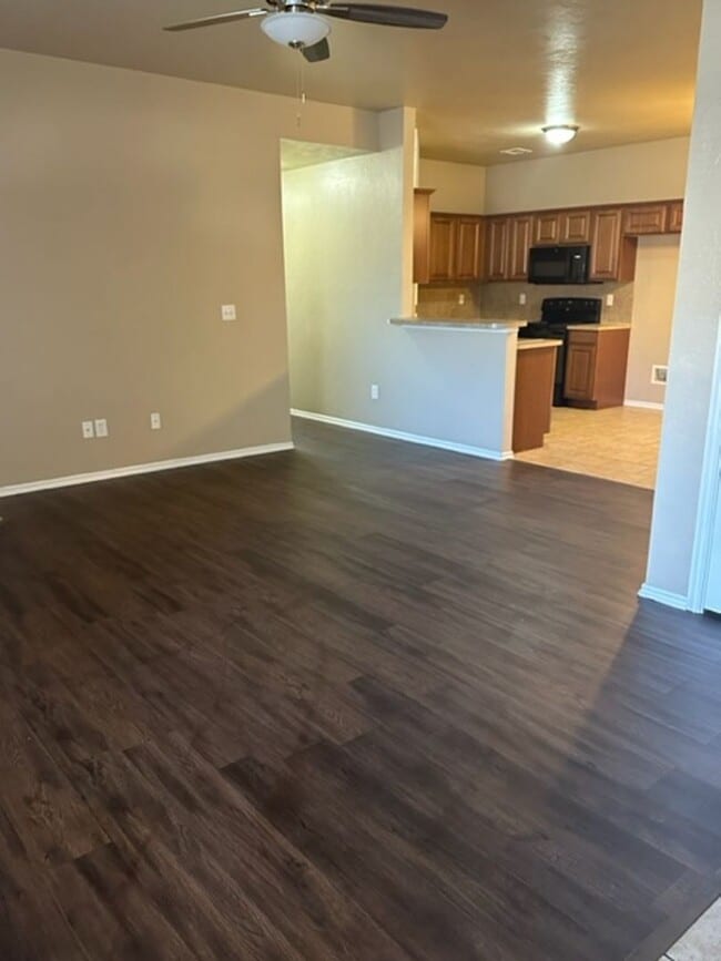 Building Photo - Great Duplex with Open Floor Plan - Wood Laminate Floors in Living
