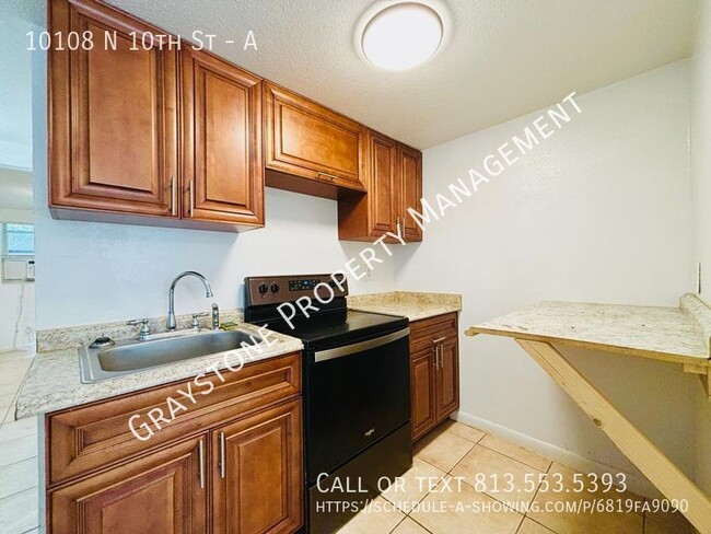 Building Photo - Budget friendly 1-Bedroom Duplex in Tampa–...