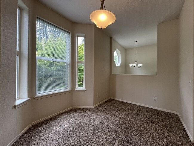 Building Photo - Spacious Three-Story Townhome Near Orenco Station with Attached Garage, Private Balcony, and Vaul...