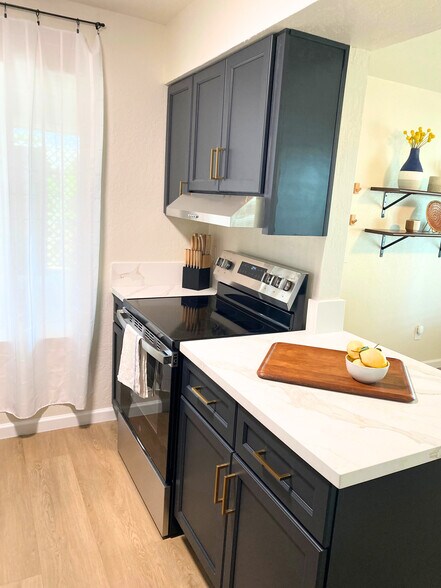 Easy & stress-free move-in experience-we’ve provided a fully stocked kitchen. - 1795 W 28th St
