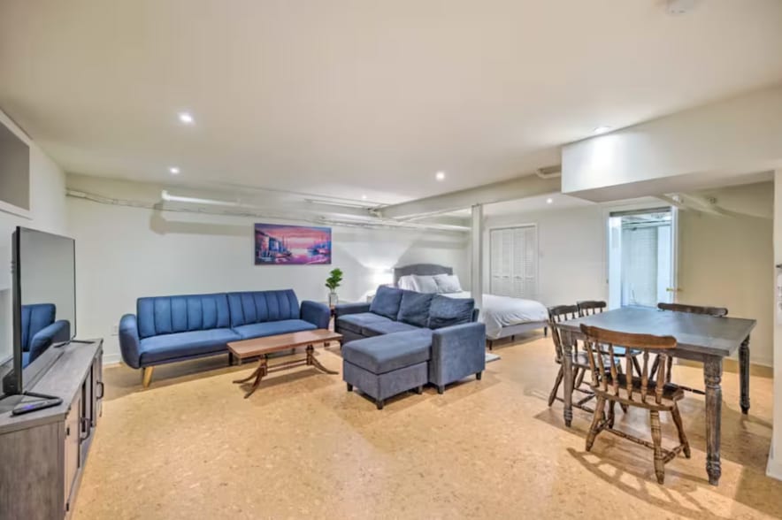 Living area, bed, dining room table - 3301 W Franklin St