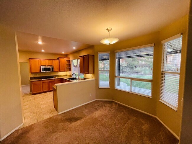 Building Photo - 42020 Dahlia Way