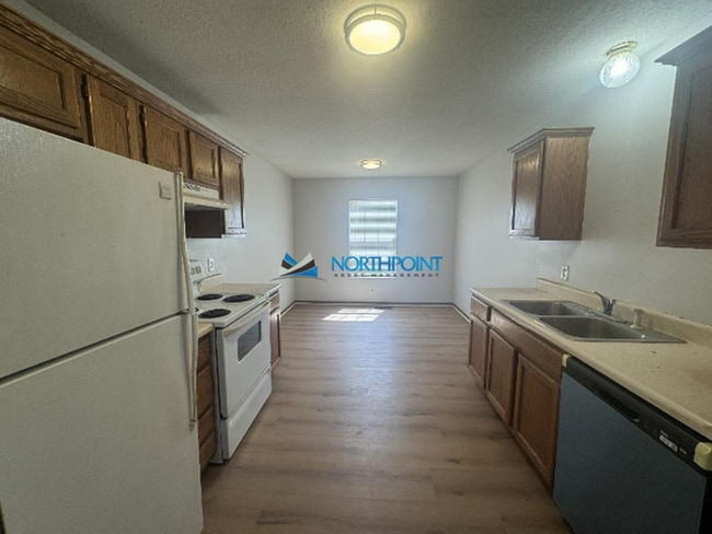 Building Photo - Spacious 3BR 2BA w/ Garage Parking • Large Backyard • Patio in Cameron