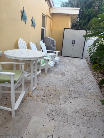 Private patio with grill and outdoor shower - 3203 NE 5th St