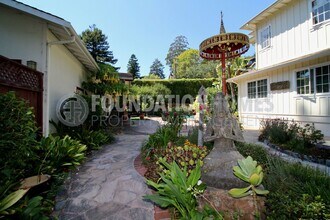 Building Photo - FURNISHED - Enjoy this little piece of par...