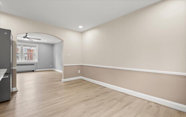 Building Photo - Updated 3BR Catonsville Townhome | Rear Parking + Deck