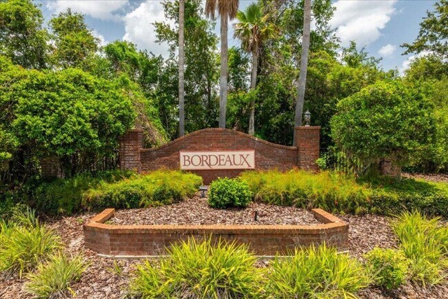 Building Photo - Charming End-Unit Condo in Gated Bordeaux Community!