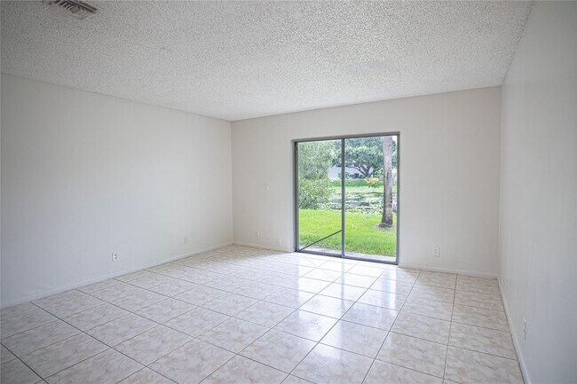 Building Photo - 4295 NW 114th Ter